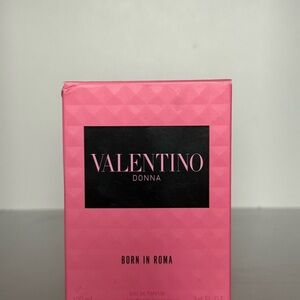 Valentino Fragrance Bottle with Black and Amber Accents